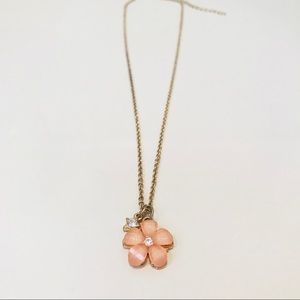 Adorable necklace with peach-coral floral pendant